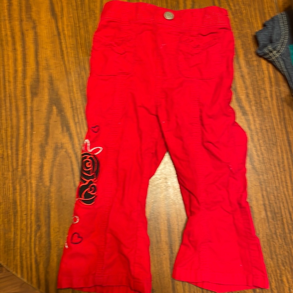 Girls 18months healthtex red corduroy pants with black design down leg flared